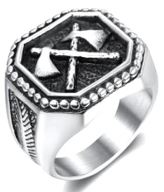 Detailed close-up of a vintage stainless steel signet ring with crossed axes design