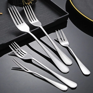 Five-piece stainless steel fork set including dinner and dessert forks on black tray