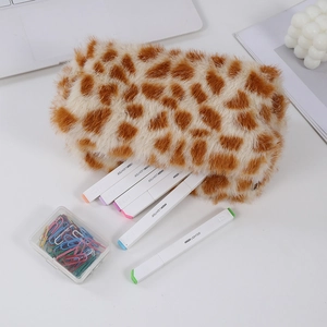 Detail of plush animal print storage bag showing spacious interior with highlighters