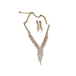 Elegant gold plated necklace and earring set with shimmering zircon tassel design