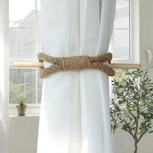 Bow-knot jute rope curtain tieback with wooden pin in Nordic minimalist style