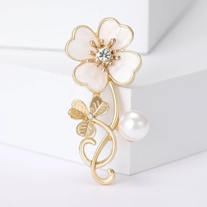 Elegant four-leaf clover shell brooch with pearl and crystal in minimalist setting