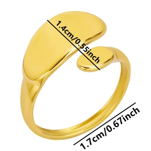 Detailed view of curved gold ring with size measurements 1.4cm and 1.7cm
