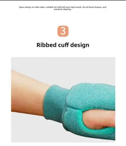 Macro detail of teal fleece exfoliating glove showing ribbed cuff and non-slip design
