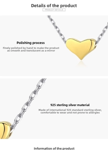 Macro shot of 925 sterling silver chain with a polished heart pendant detail