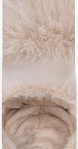 Close-up of thick thermal fleece lining and soft faux fur material for winter hats