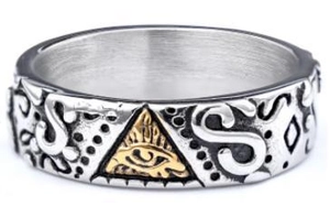 Close-up of retro silver ring featuring golden eye of providence and ornate patterns