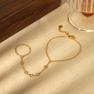 Elegant 18k gold plated hand chain with five sparkling cubic zirconia stones