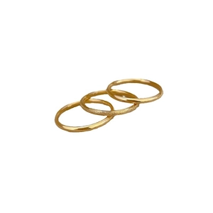 Three-piece minimalist gold titanium steel rings with polished and frosted finishes