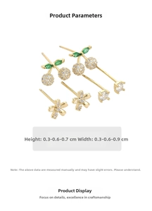 Three-pair earring set featuring cherry, flower, and crystal stud designs in gold finish