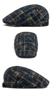 Three-angle view of vintage plaid newsboy cap in washed blue and grey cotton