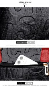 Detail of black lychee grain leather handbag featuring embossed letters and back zipper pocket