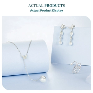 Detailed set of S925 silver butterfly jewelry with pearls, necklace earrings and ring