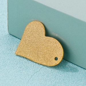 Frosted gold heart pendant with hollow design and textured finish for DIY necklaces
