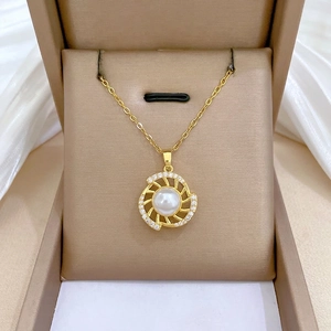 Elegant gold-tone stainless steel jewelry set with rotating pearl and zircon accents