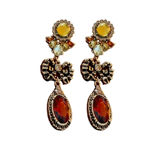 Vintage palace style oval earrings with yellow flower crystals and red amber drop pendants