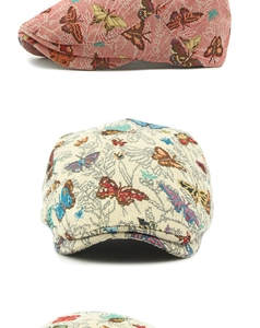 Detail van roze en beige jacquard baret hoeden met ingewikkelde vlinderpatronen