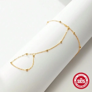 Elegant gold S925 sterling silver finger bracelet with delicate beads for women