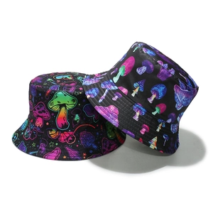 Double-sided reversible bucket hat with neon psychedelic mushroom patterns on black fabric