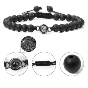 Adjustable black matte stone bead bracelet with multi-language projection pendant