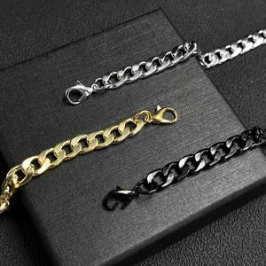 Classic cuban link chain bracelets in silver gold and black finishes on a gift box
