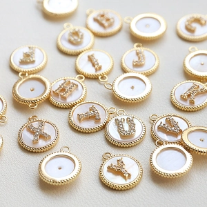 Gold plated alphabet charms with white shell inlay and zircons for DIY jewelry making