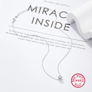 Detail of S925 sterling silver necklace featuring 6mm bead pendant and hallmark stamp