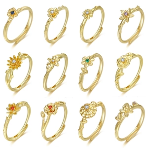 Set of 12 gold birth month flower rings with colorful zircon stones and vine band