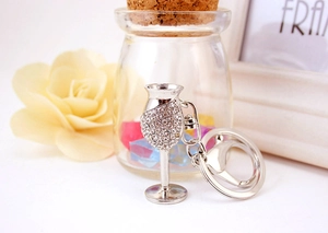 Detailed view of silver wine glass keychain with sparkling crystal rhinestones and D-ring