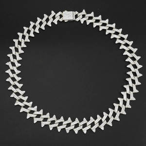 Detailed top-down view of silver iced-out Cuban link chain with square rhinestone clasp
