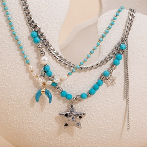 Bohemian multilayer necklace with blue turquoise beads and silver moon and star pendants