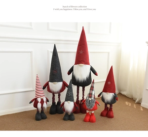 Group of six telescopic Christmas gnomes with tall pointed hats and long plush legs