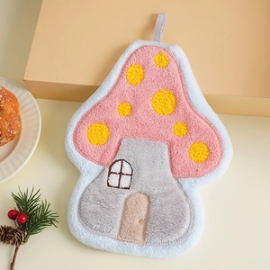 Detail of coral fleece mushroom hand towel with hanging loop in soft pink and grey