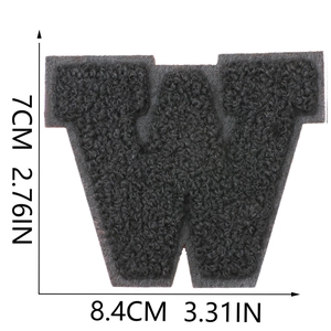 Detail view of 7cm black chenille letter W patch showing embroidery texture and dimensions