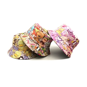 Colorful kids cotton bucket hats with cute animal prints including yellow and pink options