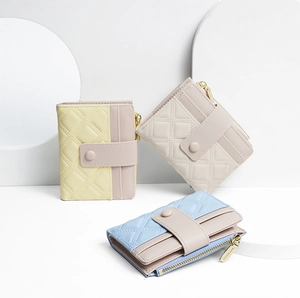 Three-color pastel PU leather wallets featuring diamond quilting and gold zippers