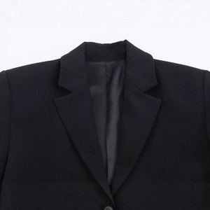 Women's black blazer dress featuring lace hem patchwork and classic notch lapel details
