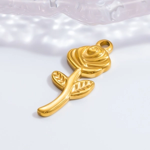 Close-up of 18K gold plated rose flower pendant with leaf detail for DIY jewelry