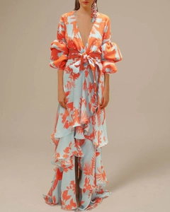 Bohemian floral maxi dress with deep V-neck, balloon sleeves and tiered ruffle hem in orange