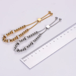 Detailed scale measurement showing adjustable stainless steel bead bracelets with rhinestones
