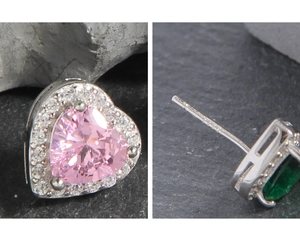 Macro shot of S925 sterling silver heart earrings with pink and green zircon stones