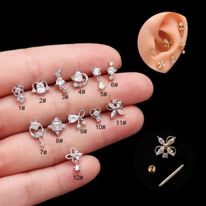 Set of 12 stainless steel screw back ear studs with zircon in gold and silver finish