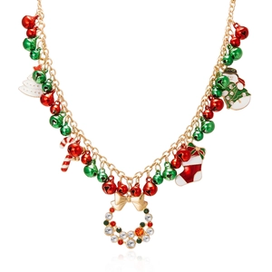Festive gold Christmas necklace with wreath, snowman, tree and bell charms on white background