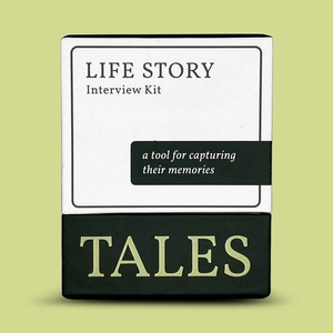 Life Story Interview Kit in black and white box for capturing memories on green background