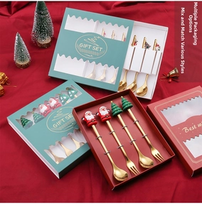 Golden Christmas stainless steel cutlery set with Santa and tree silicone motifs in gift box