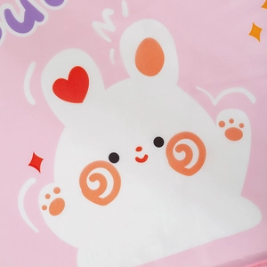 Close-up of pink moisture-proof storage bag featuring a cute white bunny and stars print