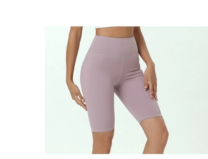 Close-up of lavender high-waisted yoga shorts showing quick-dry fabric and seamless stitching
