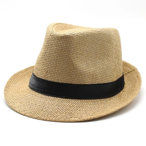 Close-up of the detailed linen straw weave and black ribbon on the sun hat fedora