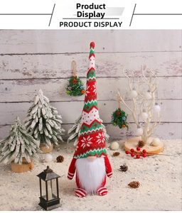 Macro detail of Christmas gnome doll featuring a knitted snowflake hat and plush beard texture