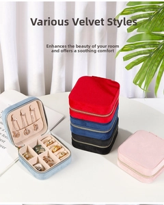 Detailed internal view of velvet jewelry box with necklace hooks and ring compartments